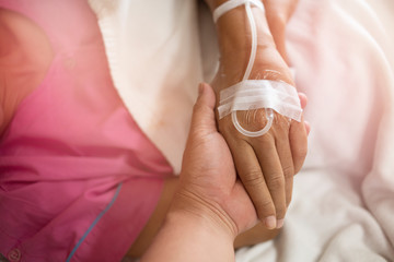 selective focus of patient's hand in hospital