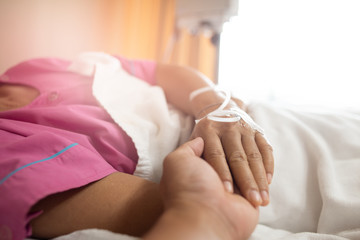selective focus of patient's hand in hospital