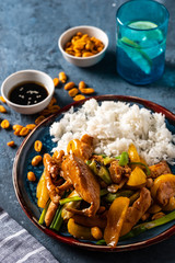 Kung Pao chicken, stir-fried Chinese sichuan traditional sichuan  dish with chicken, peanuts, vegetables and chili peppers.