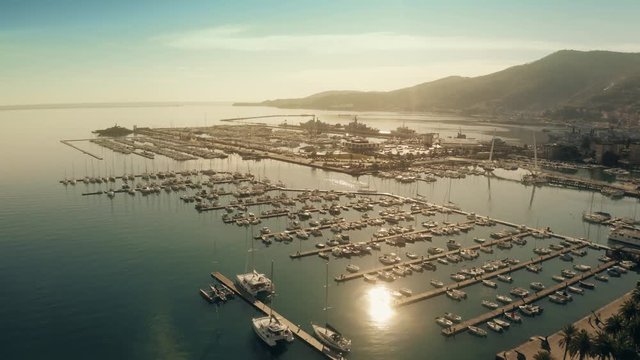 Aerial view of Porto Mirabello harbour in Spezia and distant Porta Marola naval base, Italy