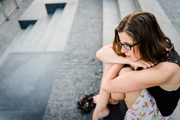 Sorrowful young woman isolated outdoors