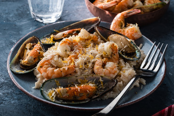 Risotto with seafood. Rice with shrimps and mussels.