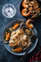 Risotto with seafood. Rice with shrimps and mussels.