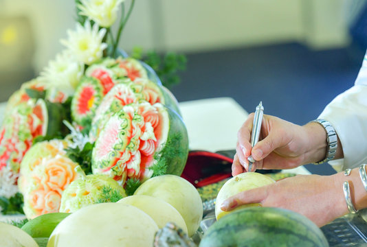 Thai fruit carving with hand, Vegetable and Fruit Carving