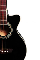 Fototapeta premium Acoustic guitar on a white background. Close-up