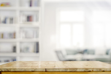Empty wooden desk table in living room background