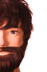 Male mannequin with a beard and long hair. On a white background. Copy space. Hairdressing