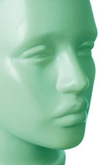 Male plastic mannequin. Face. Close-up. On a white background