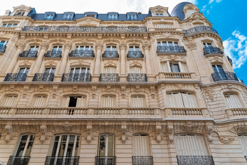     Paris, beautiful building in winter, typical parisian facade in the Marais, view from the square du Temple 