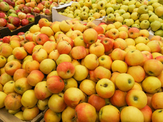 Ripe apples in the store as background