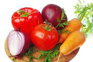 Red tomatoes, carrots, beets, cabbage. Isolated on white