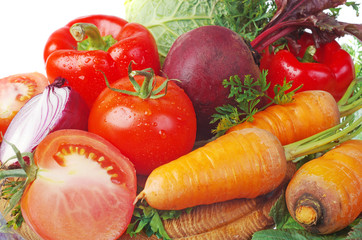 Red tomatoes, carrots, beets, cabbage. Isolated on white