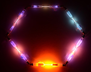 Hexagon of Geissler tubes with different gases.