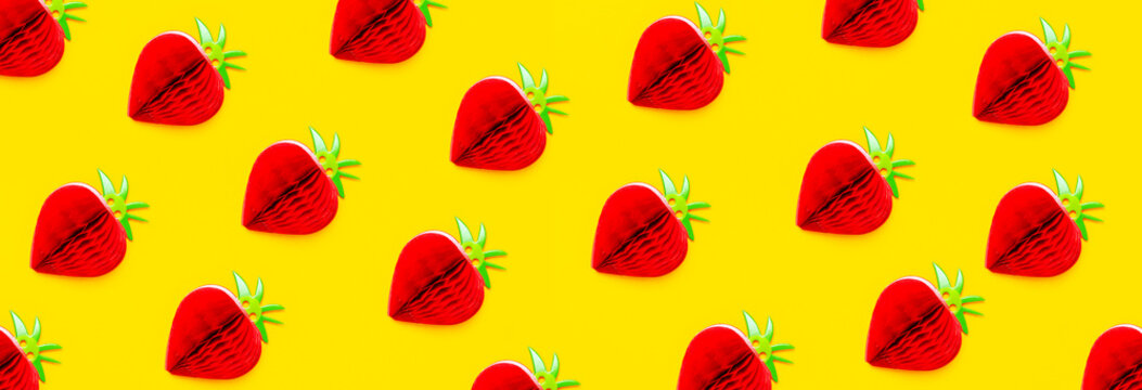 Flat lay Pattern bright sweet red strawberry of paper on yellow background top view copy space. Minimalistic creative summer food concept, origami paper fruit berry. Strawberry Background