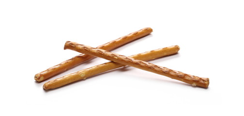 Salty cracker pretzel sticks isolated on white background