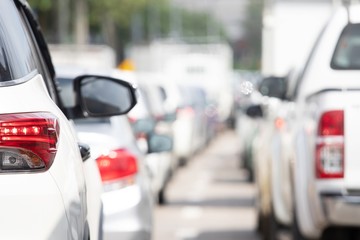 Fototapeta premium traffic lines ways traffic jam in a city street road row of car on express way in rush hour duration late morning. parking car. transportation travel concept.