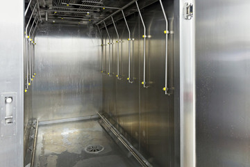 Empty smokehouse for sausages in the meat plant.