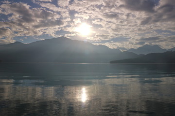 Beautiful landscape view of mountain and lake with reflection in the morning under sky and cloud, Nantou, Taiwan
