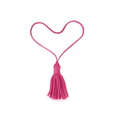 Pink heart of silk tassels isolated on white background