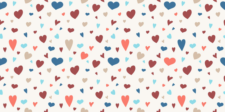 Cute seamless pattern with colorful hand drawn hearts. Valentine's Day, Mother's Day and Women's Day. Vector