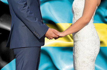 Husband and Wife holding hands - Conceptual photograph of marriage in Bahamas