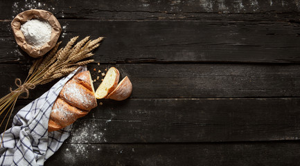 Still life with bread, flour and spikelets