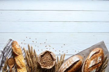 Still life with bread, flour and spikelets