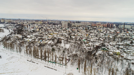 Obraz premium winter city pano with lot of houses and snow showed from drone , aerial photo 
