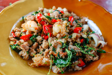 Rice topped with stir-fried pork and basil