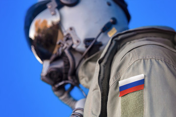 Obraz premium Air force pilot flight suit uniform with Russia flag patch. Military jet aircraft pilot