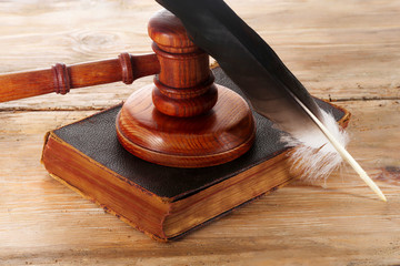 Law gavel or judge mallet on a wooden desk