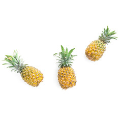 Pineapple fruits isolated on white background. Flat lay, top view. Natural food concept.