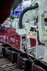 Industrial robots are doing welding work