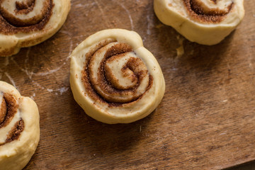 buns  with cinnamon - Cinnabon cooking process. (food background). copy space