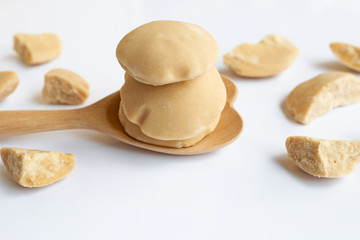 Coconut sugar on white.