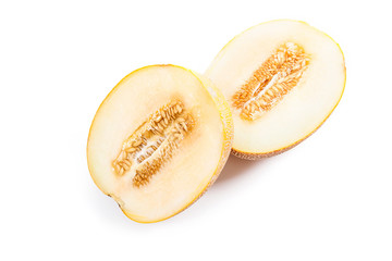 Half honeydew melon tropical fruit isolated on a white background.