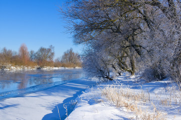 Winter river and blue sky