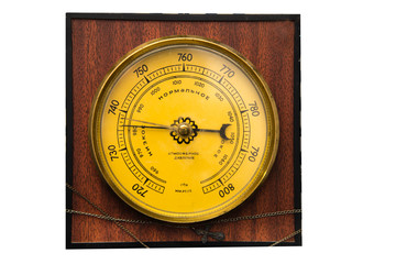 The vintage wooden barometer isolated , household barometer . Inscriptions on the surface, translated from Russian: Atmosphere pressure, low, normal, high.