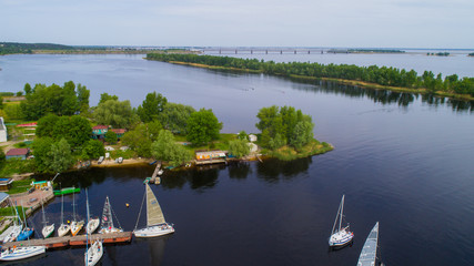 Naklejka na ściany i meble river yacht club with lot of yachts showed from drone , aerial view 