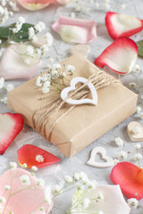 Fototapeta na wymiar Gift boxes with flowers and hearts