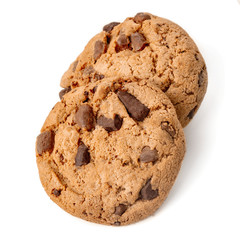 Freshly baked  cookies with chocolate pieces isolated on white background. Macro image