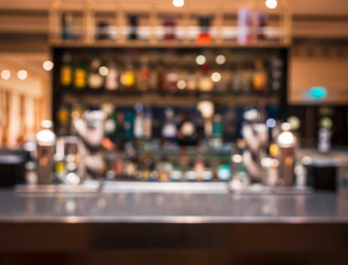 Fototapeta na wymiar Table top counter Bar pub restaurant Blur cocktail shelf colourful background