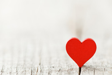 Fototapeta premium Red heart on wooden background