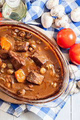 Beef Bourguignon stew in a casserole dish