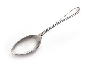 old silver spoon isolated on white with clipping path included