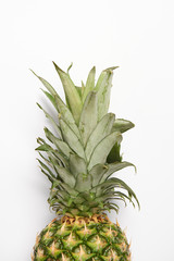 close up of tasty organic pineapple on white background