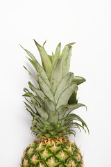 Fototapeta premium close up of tasty organic pineapple on white background