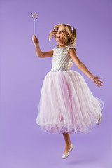 Full length portrait of a smiling pretty girl © Drobot Dean