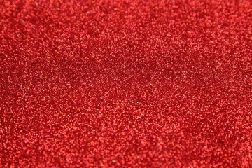 Beautiful texture of red sparkles. glitter background. shiny texture
