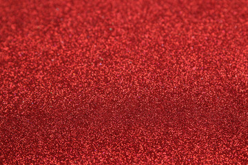 Beautiful texture of red sparkles. glitter background. shiny texture